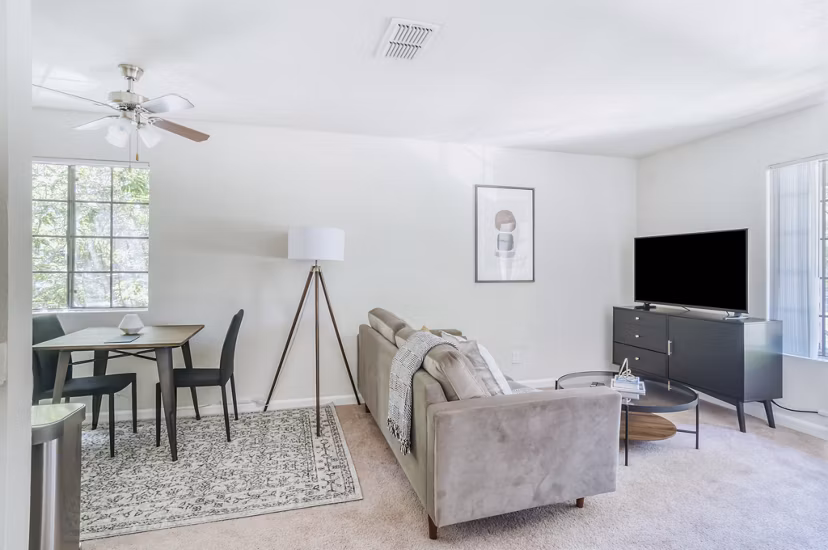 Spacious living room with modern furnishings at Ygnacio Village Apartments