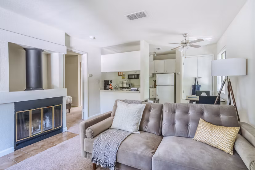 Spacious living room with modern decor and natural lighting in Ygnacio Village Apartments, perfect for luxury living at Greystar community