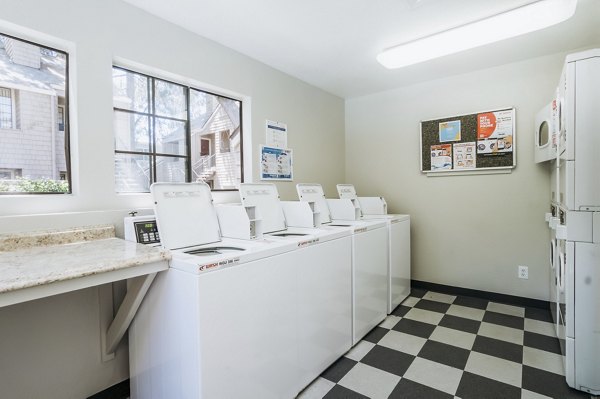 Laundry room with modern appliances in Ygnacio Village Apartments, Greystar luxury community in scenic Lafayette