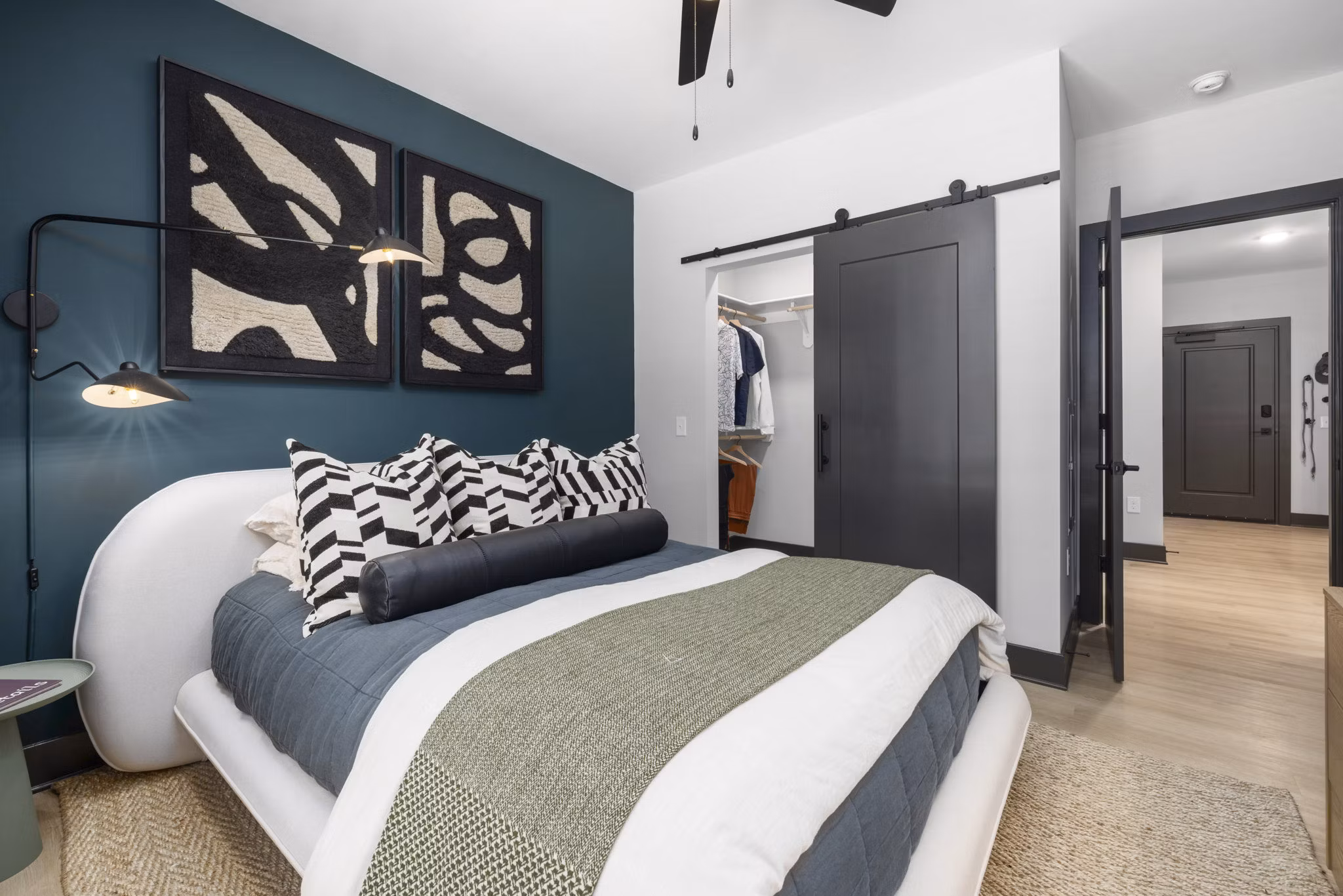 Contemporary bedroom featuring modern design at The Miles Apartments in luxury Greystar community