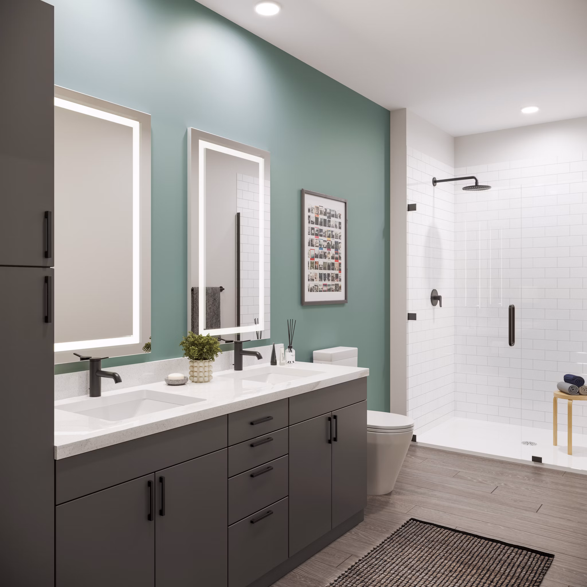 Modern bathroom featuring sleek fixtures and bright lighting at The Miles Apartments
