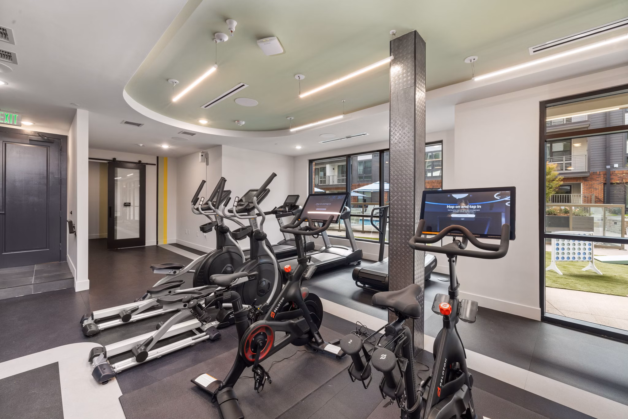 fitness center at The Miles Apartments