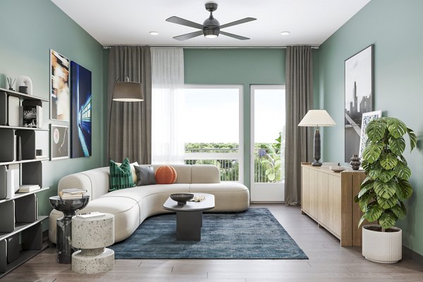 Modern living room with sleek furniture and large windows at The Miles Apartments