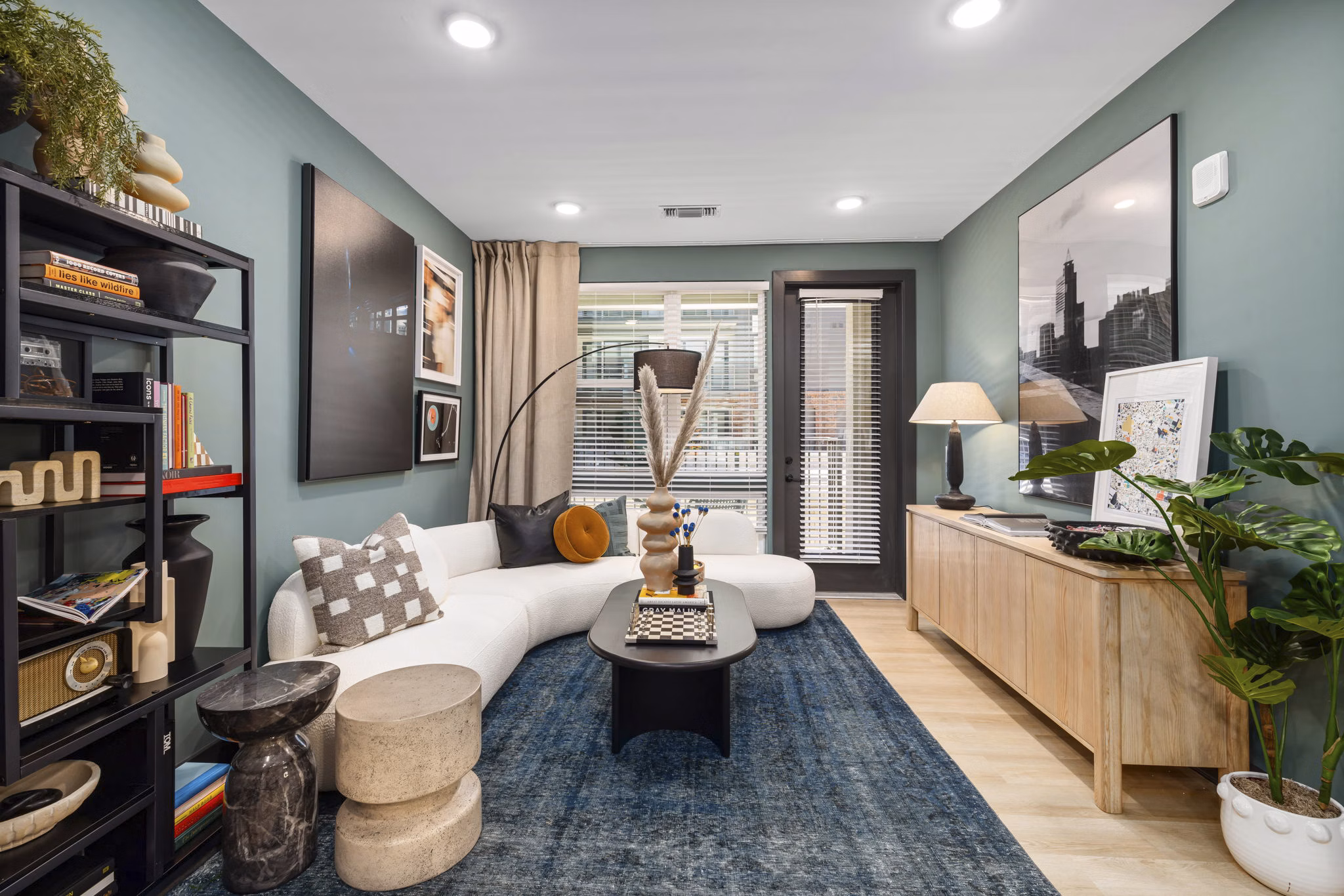 Cozy living room with modern design elements at The Miles Apartments, offering luxurious urban living
