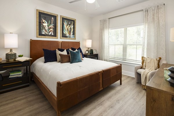 Luxurious bedroom with modern decor at Arcadia at Symphony Park Apartments