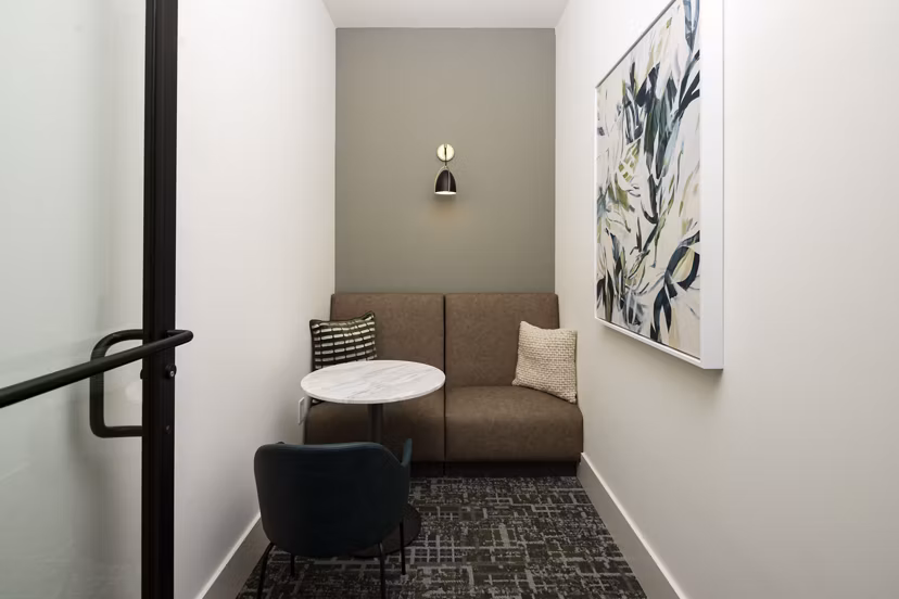Clubhouse with plush seating at Arcadia at Symphony Park Apartments