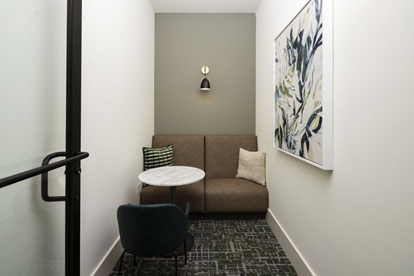 Clubhouse with plush seating at Arcadia at Symphony Park Apartments