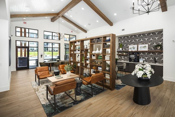 Spacious living room with modern decor at Arcadia at Symphony Park Apartments