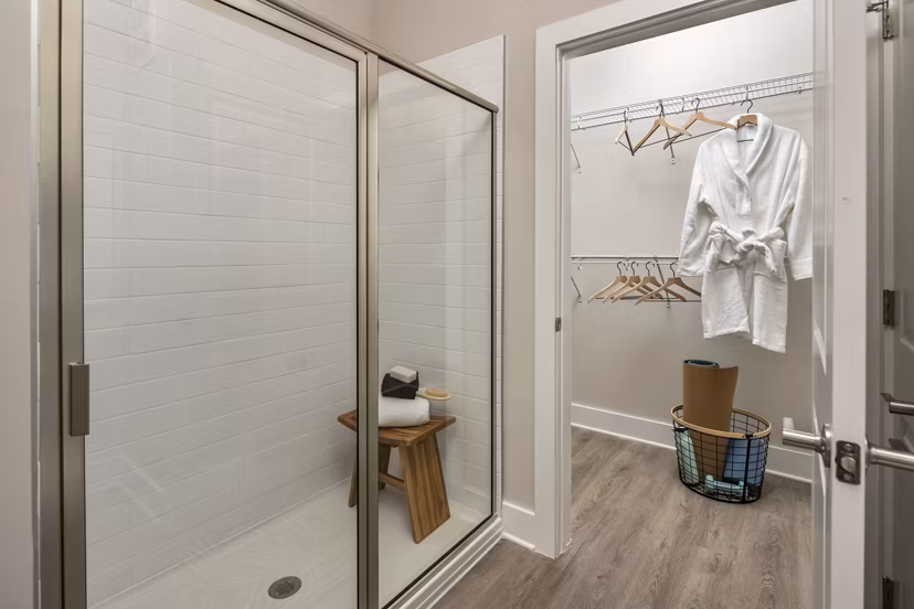Laundry room featuring modern washer and dryer at Arcadia at Symphony Park Apartments