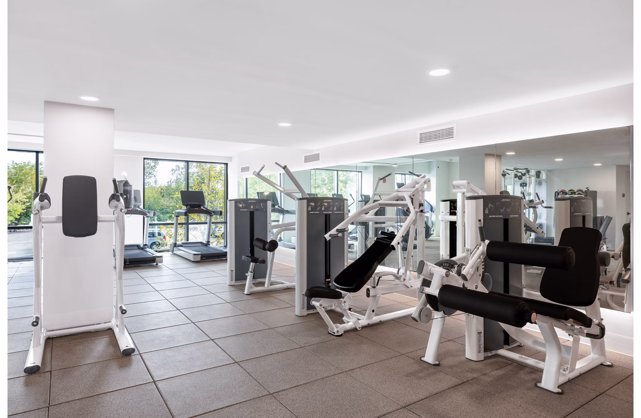 fitness center at One Grove Apartments