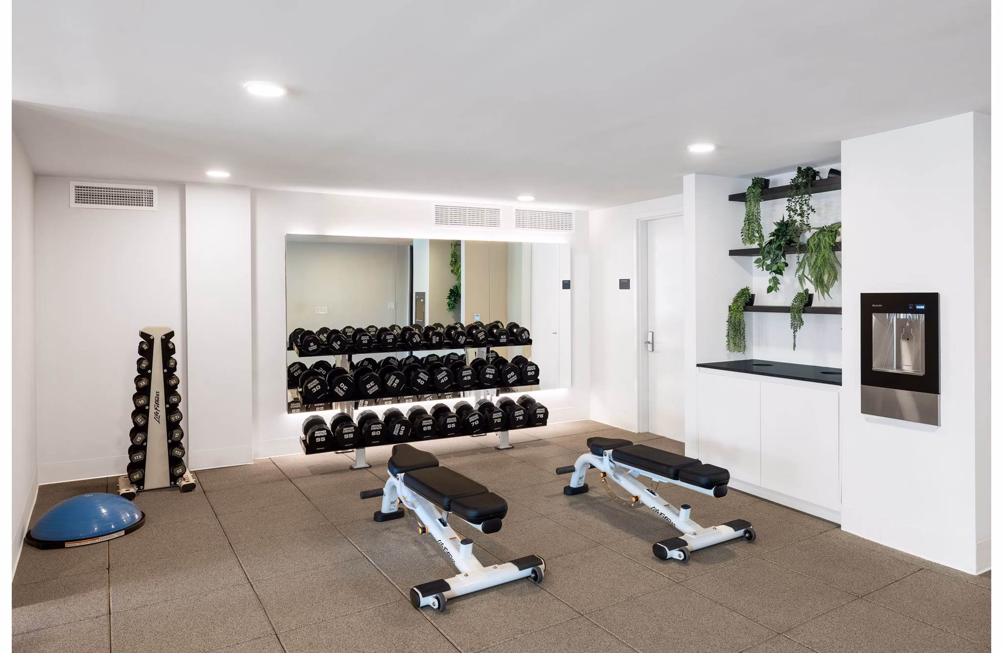 fitness center at One Grove Apartments