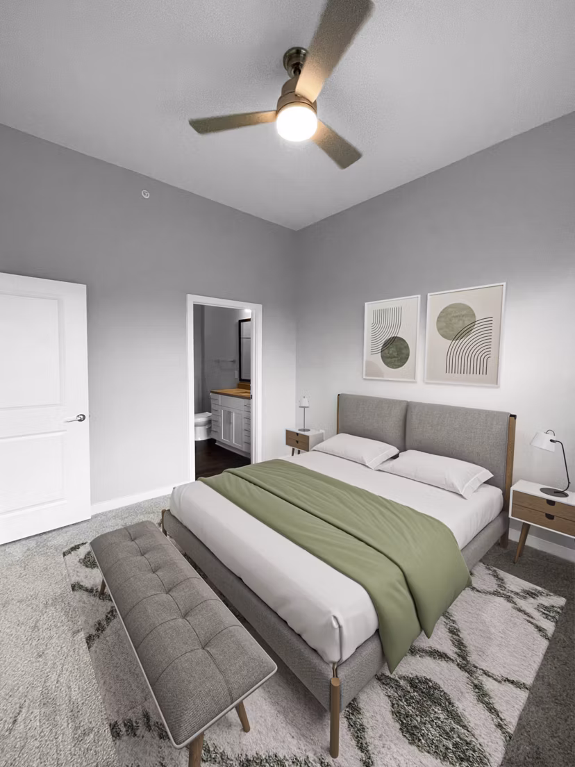 Spacious bedroom with modern decor and natural lighting at Camellia at One Nexton Apartments