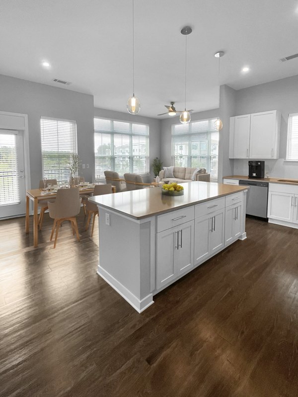Clubhouse featuring modern decor and seating at Camellia at One Nexton Apartments, offering a luxury social space for residents