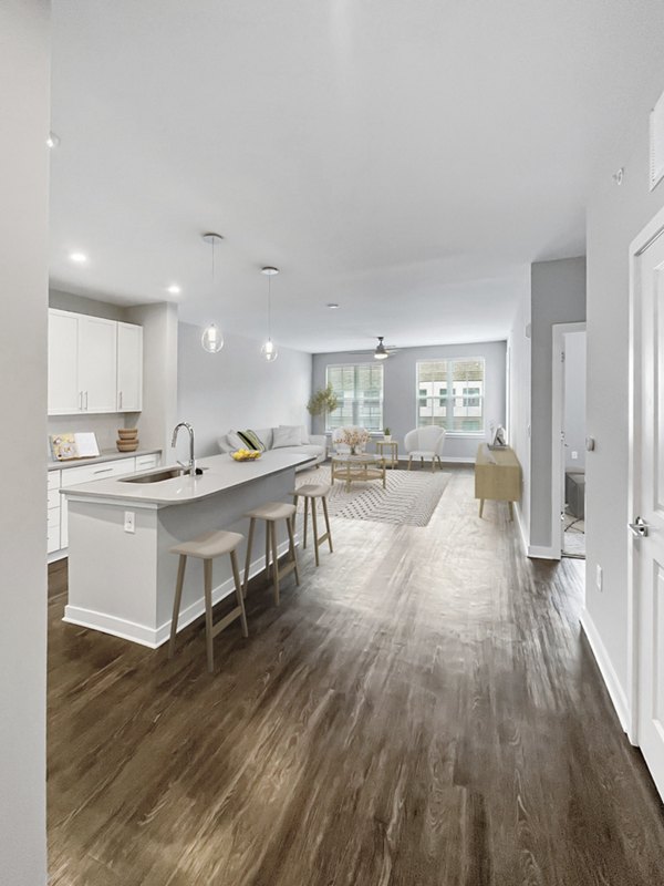 Modern clubhouse with cozy seating areas at Camellia at One Nexton Apartments, perfect for community gatherings and events