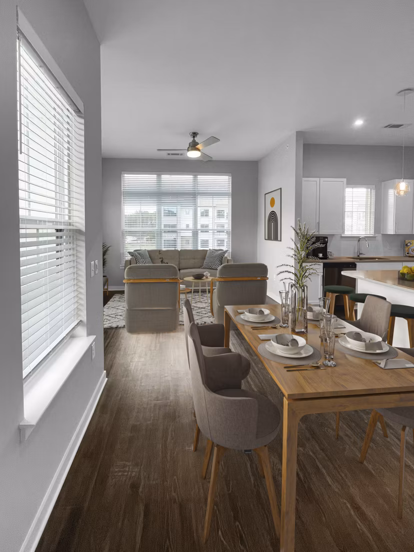 Dining room featuring modern furniture and stylish lighting at Camellia at One Nexton Apartments