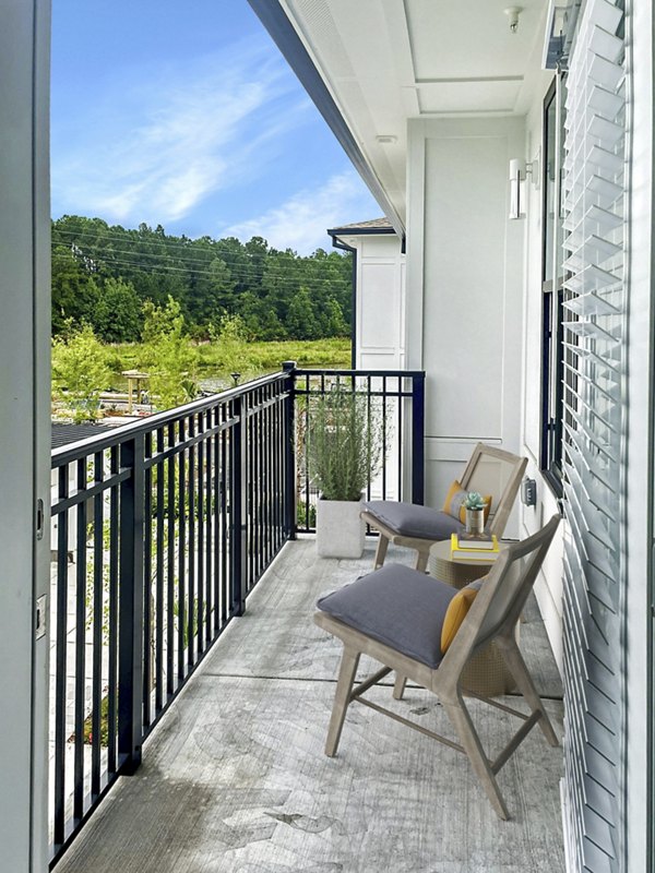 Patio featuring modern furniture at Camellia at One Nexton Apartments