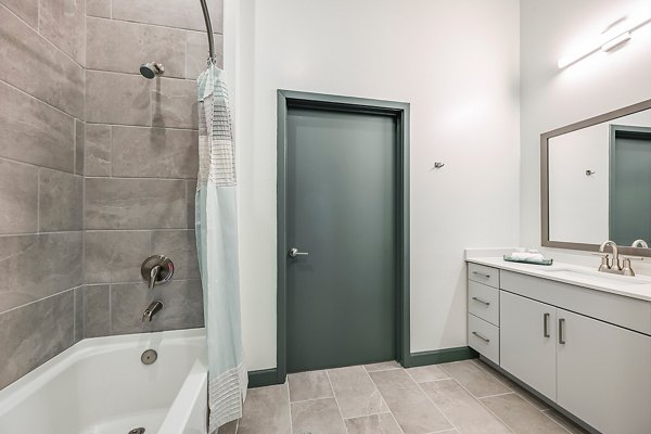 Bathroom showcasing modern fixtures at Apollo Apartments