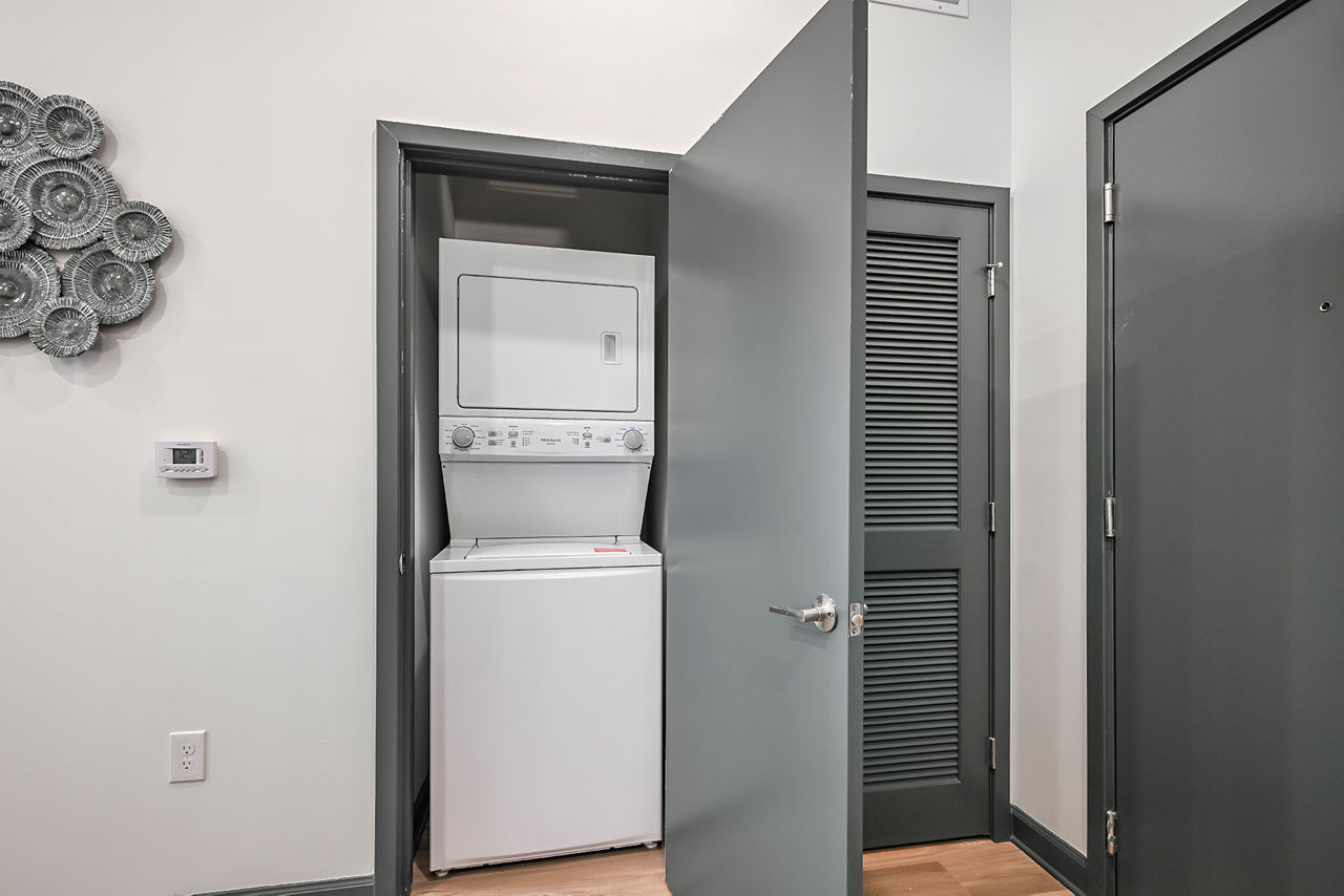 Laundry room at Apollo Apartments