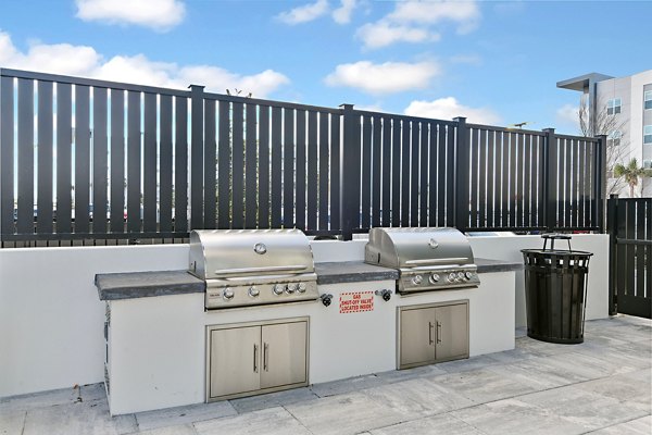 grill area at Apollo Apartments 