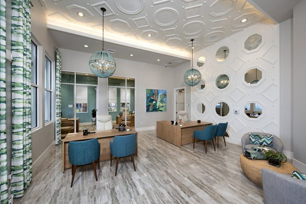 Clubhouse with modern design at SUR Lake Buena Vista Apartments offering communal spaces for residents to relax and socialize