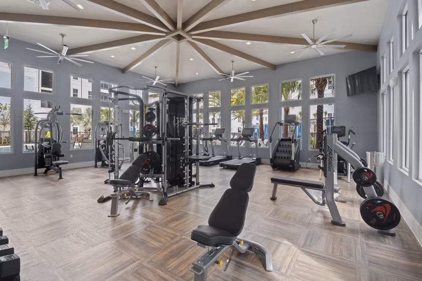 Fitness center with modern equipment at SUR Lake Buena Vista Apartments