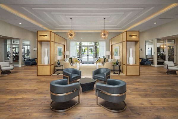 Contemporary clubhouse with stylish seating and modern decor at SUR Southside Quarter Apartments