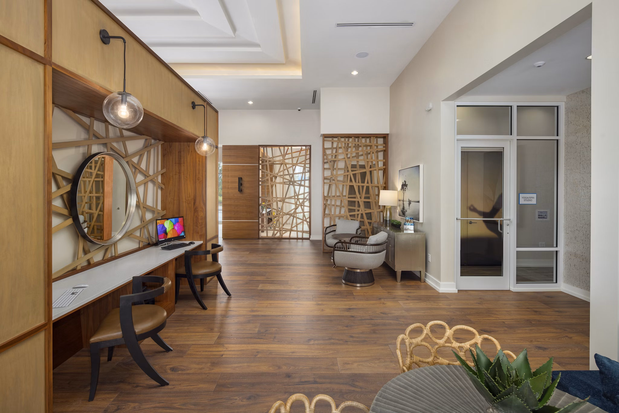 Clubhouse with modern design features at SUR Southside Quarter Apartments