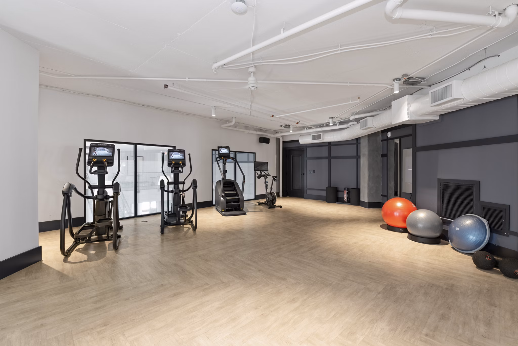 fitness center at 704 at The Quarter Apartments