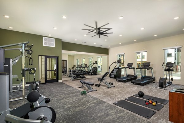 fitness center at Jefferson Avena Apartments