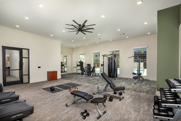 fitness center at Jefferson Avena Apartments