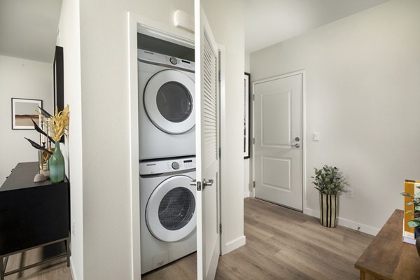 laundry facility at Jefferson Avena Apartments