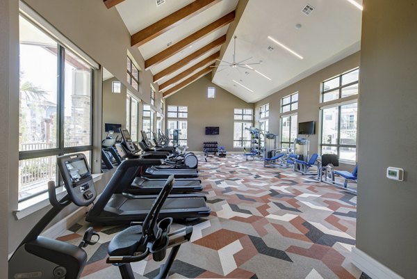 fitness center at The Pointe at Valley Ranch Town Center Apartments