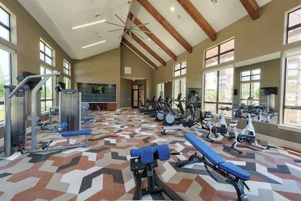 fitness center at The Pointe at Valley Ranch Town Center Apartments