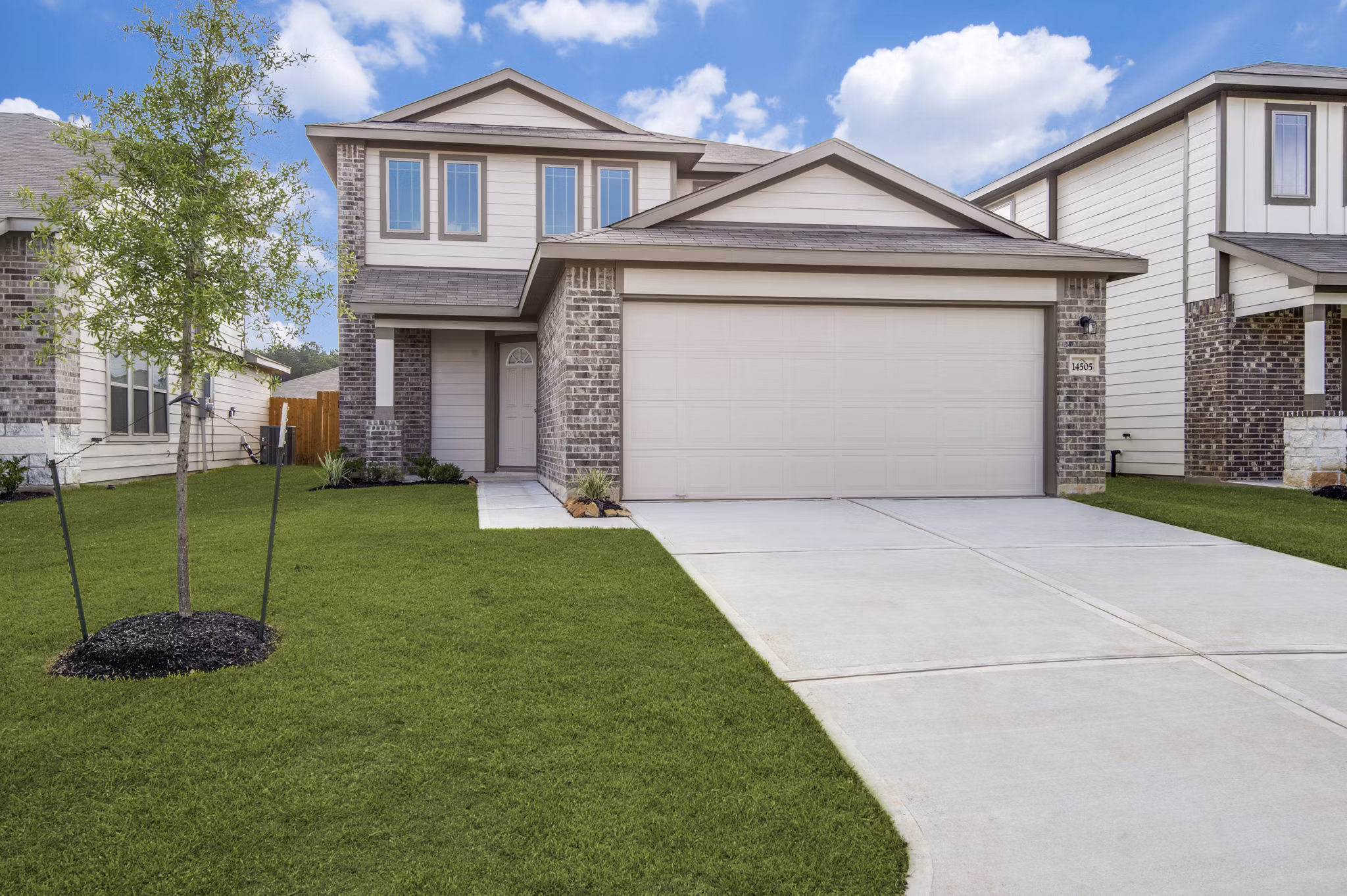 building at Village at Granger Pines Apartments