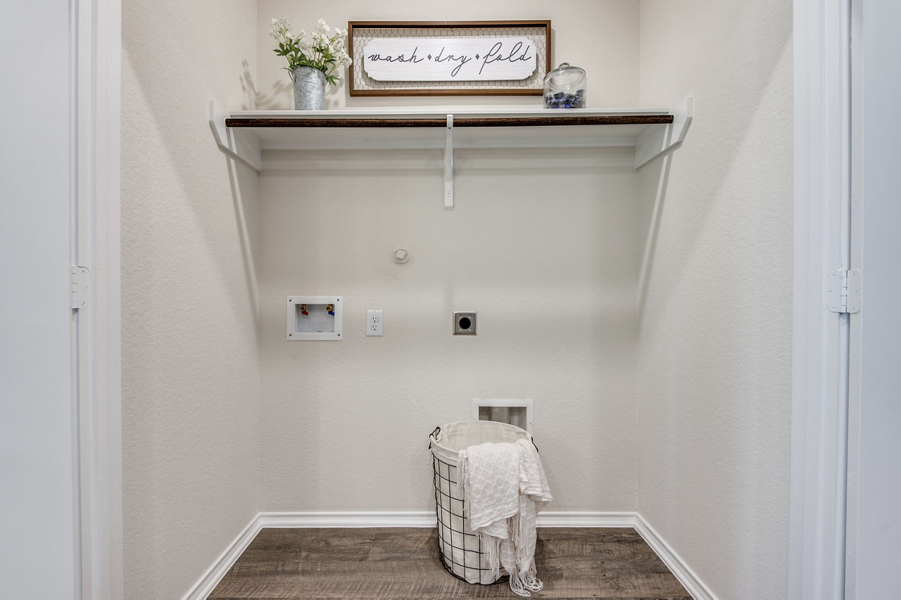 Laundry room at Village At Granger Pines