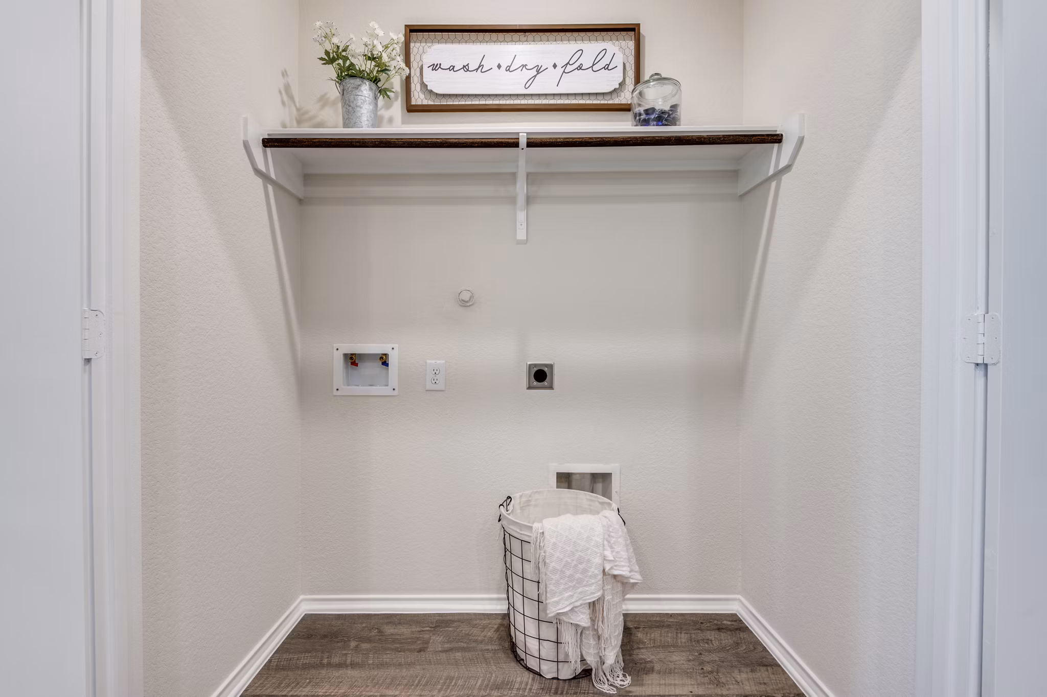 closet at Village at Granger Pines Apartments