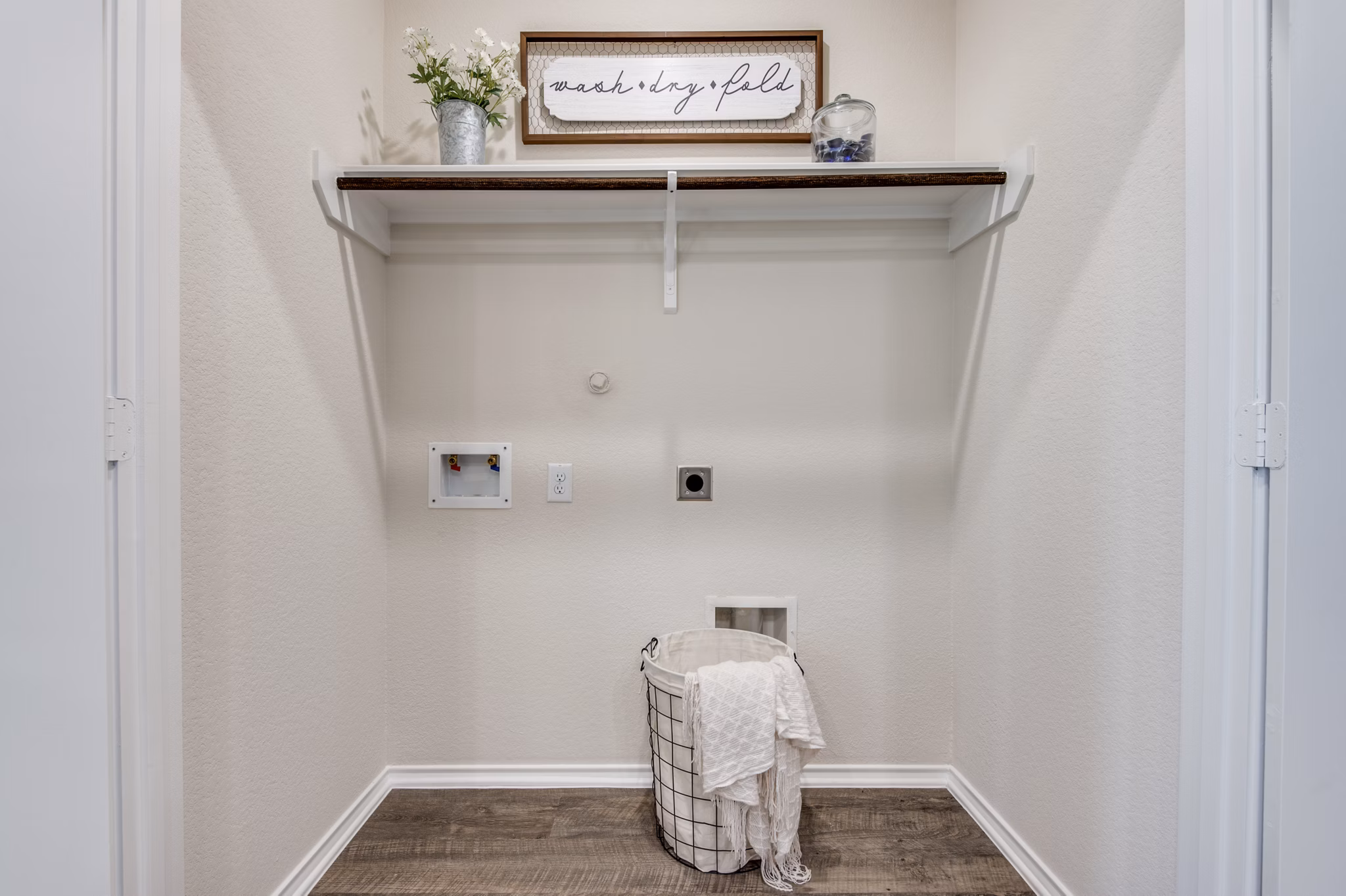 closet at Village at Granger Pines Apartments