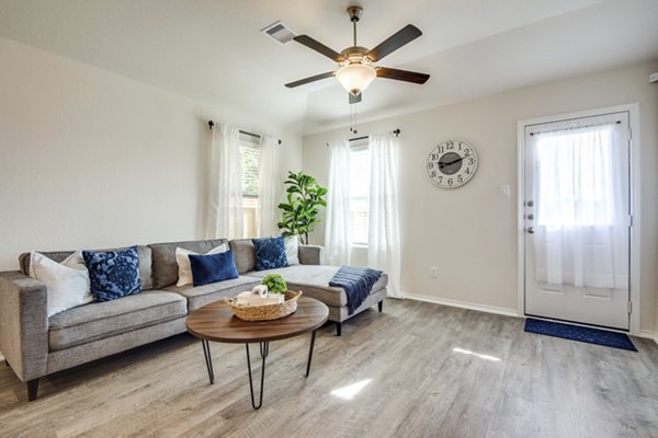 living room at Village at Granger Pines Apartments