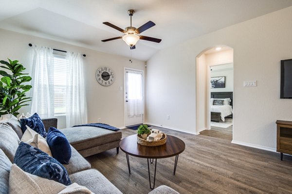 living room at Village at Granger Pines Apartments