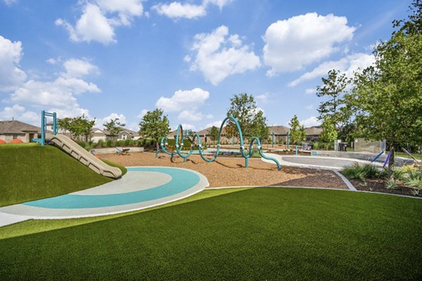 playground at Village at Granger Pines Apartments
