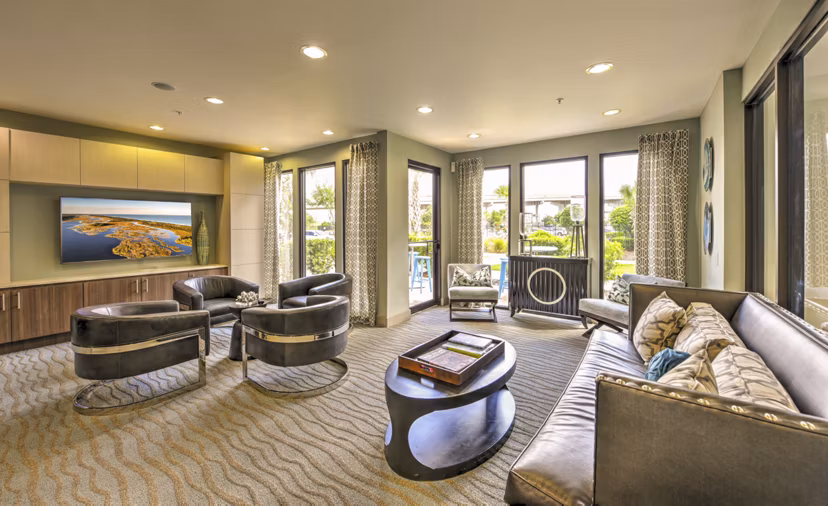 The Views at Harbortown: Modern clubhouse featuring luxurious decor and ample seating