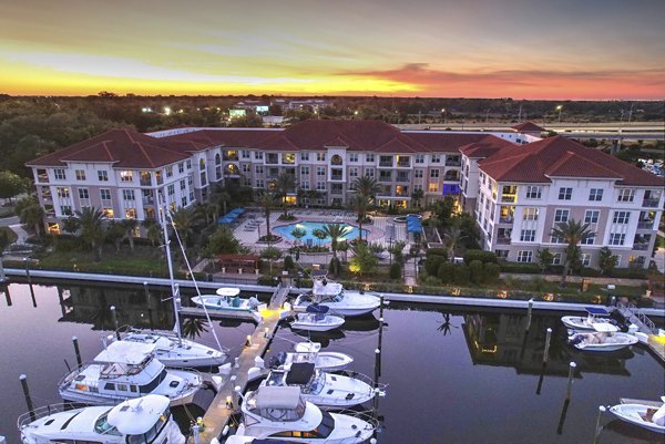 Scenic waterfront view from The Views at Harbortown Apartments overlooking the marina in a luxury setting