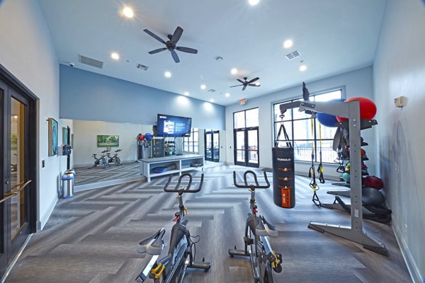 fitness center at Trifecta Apartments