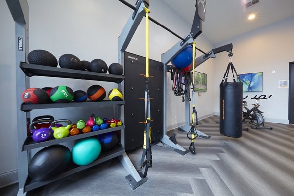fitness center at Trifecta Apartments