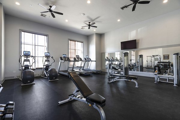 fitness center at Trifecta Apartments