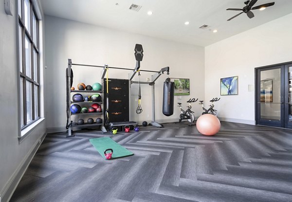 fitness center at Trifecta Apartments