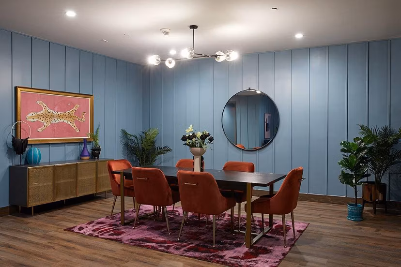 Meeting room with modern design and conference table at The Highline Apartments