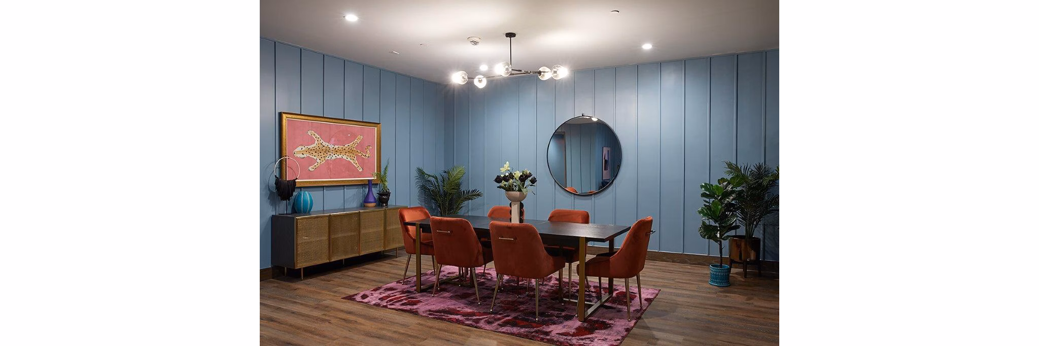 Meeting room with modern design and conference table at The Highline Apartments
