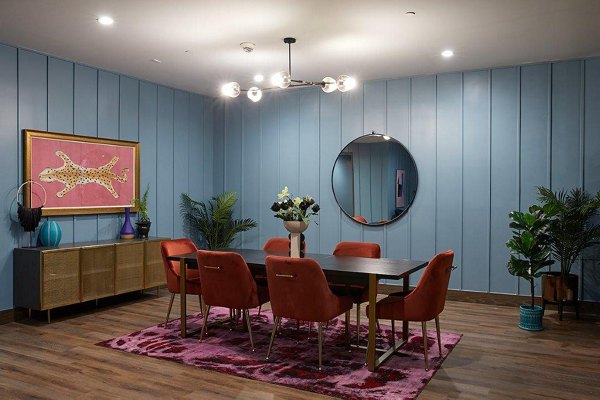 Meeting room with modern design and conference table at The Highline Apartments