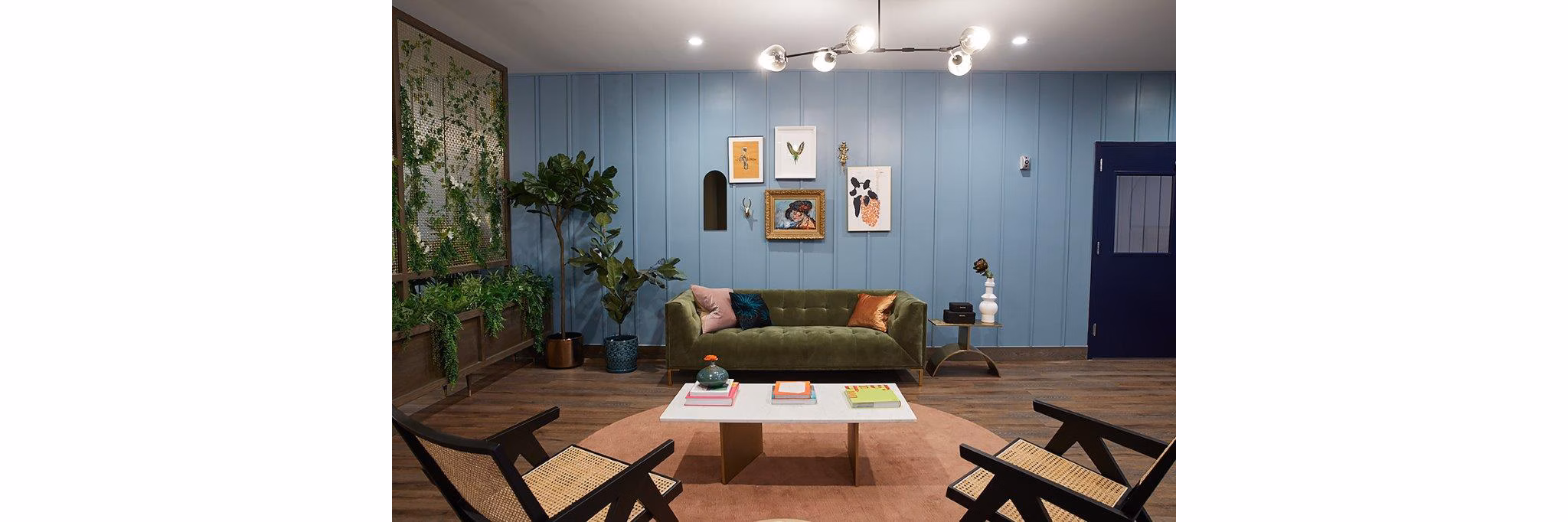 Clubhouse featuring modern design and seating at The Highline Apartments